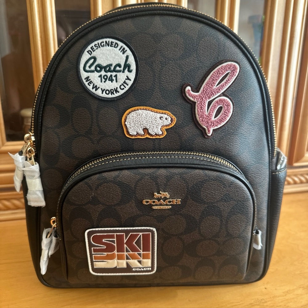 Coach Court Backpack with Ski patches.